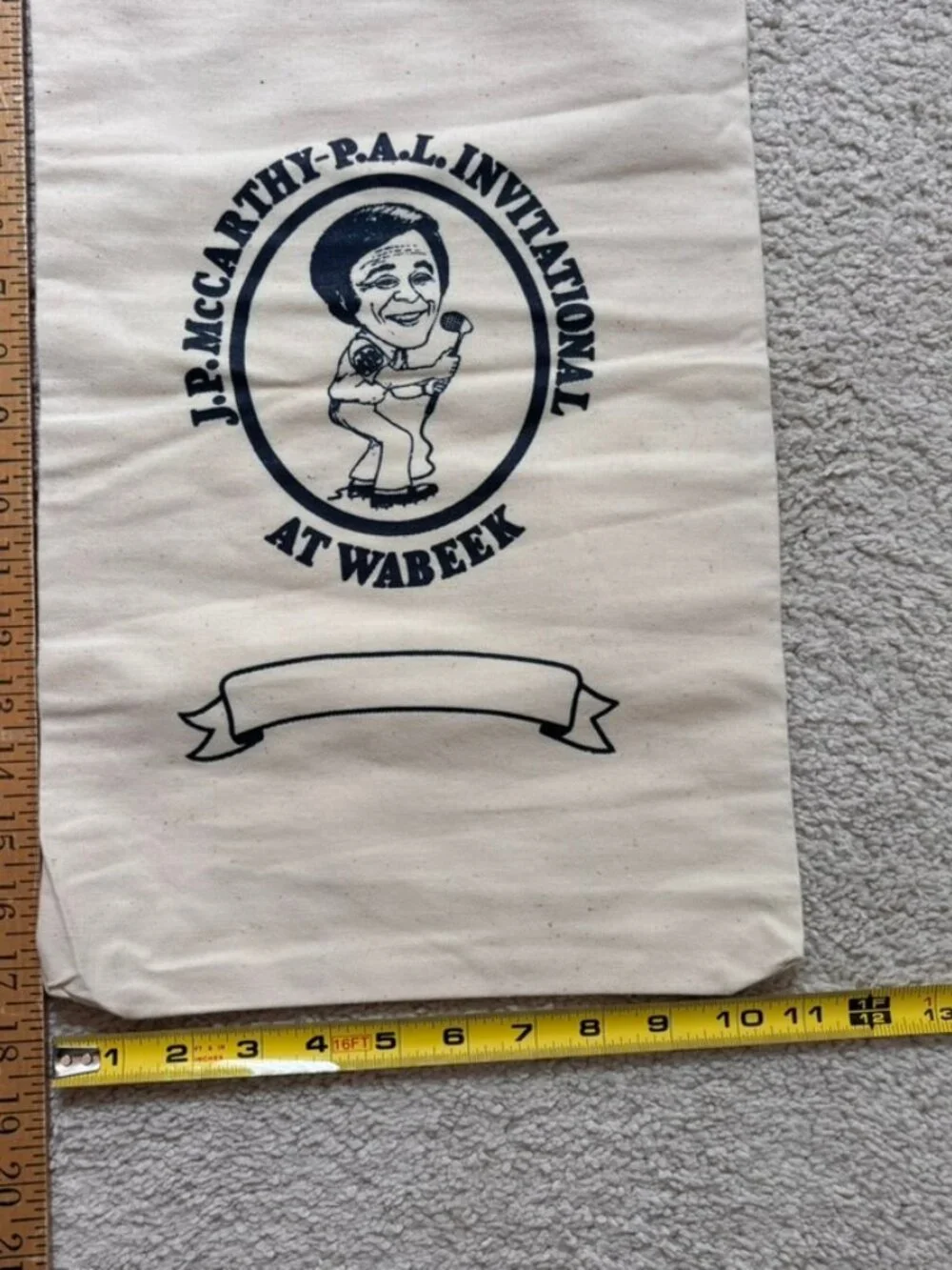 Vintage drawstring bag reads J.P. McCARTHY-P.A.L. INVITATIONAL AT WABEEK